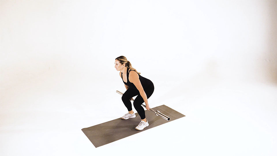 Sentadilla Hack con Barra