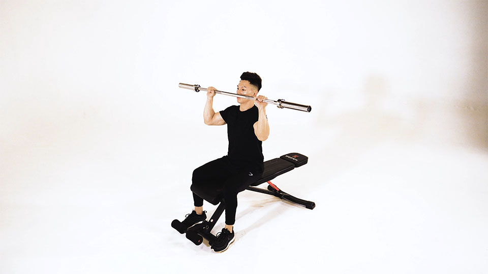 Press de tríceps sentado