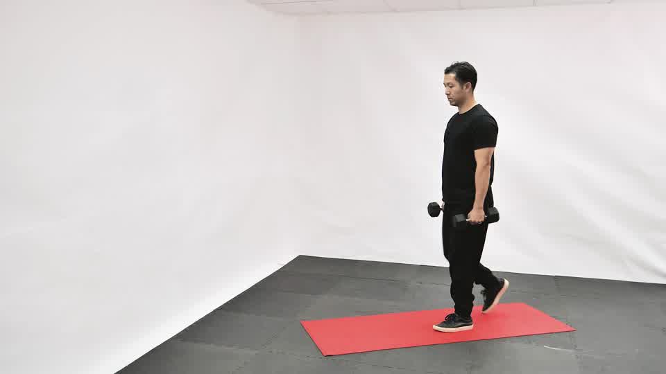 Paseo del granjero con mancuernas