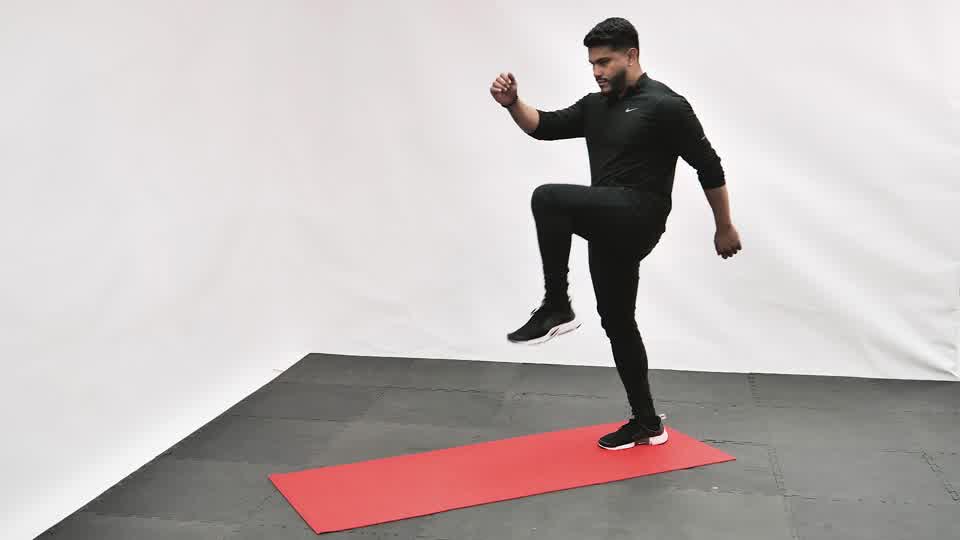 Elevación de rodillas al pecho